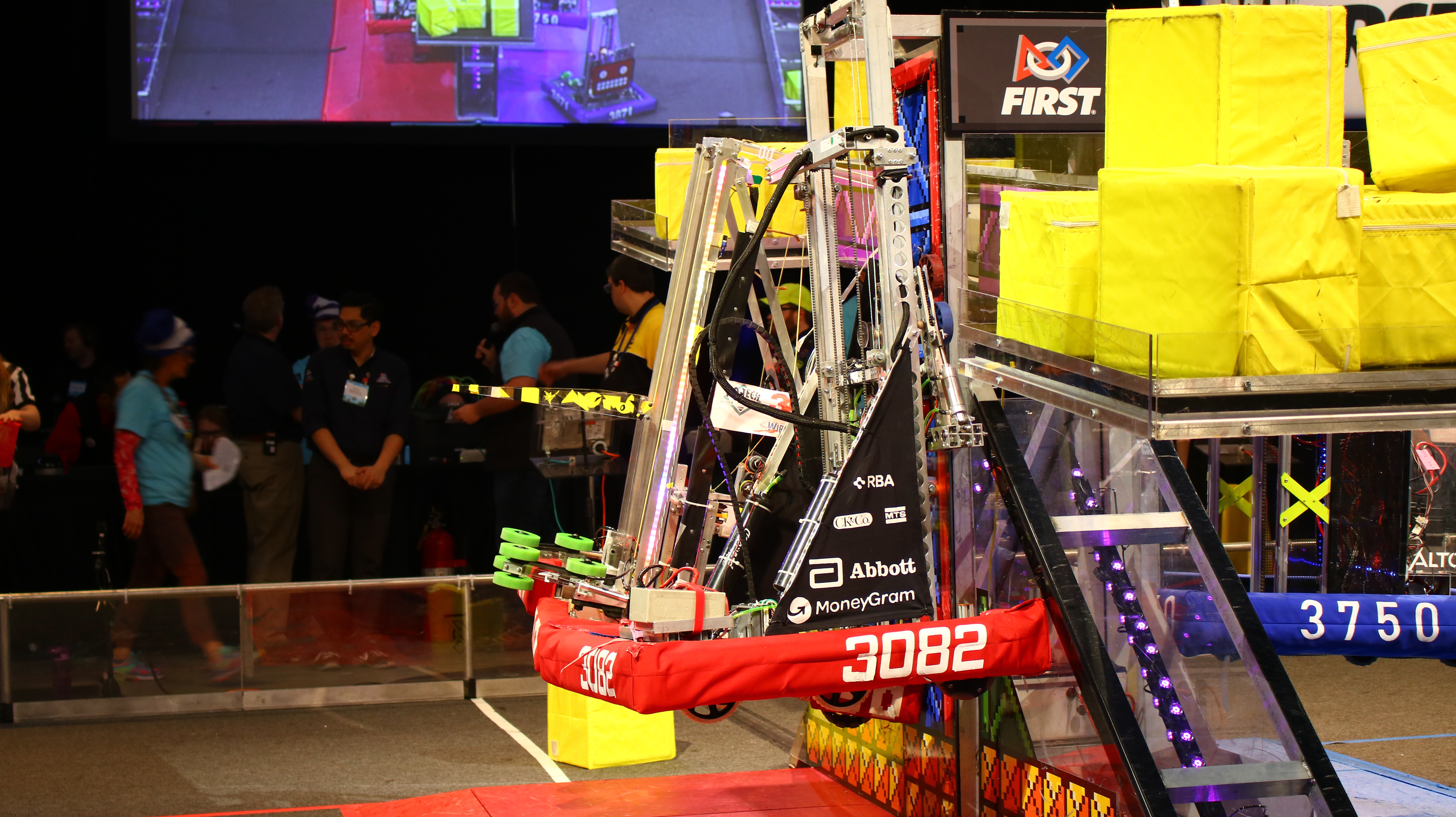 Team 3082's robot for 2018 climbing at the end of a match.