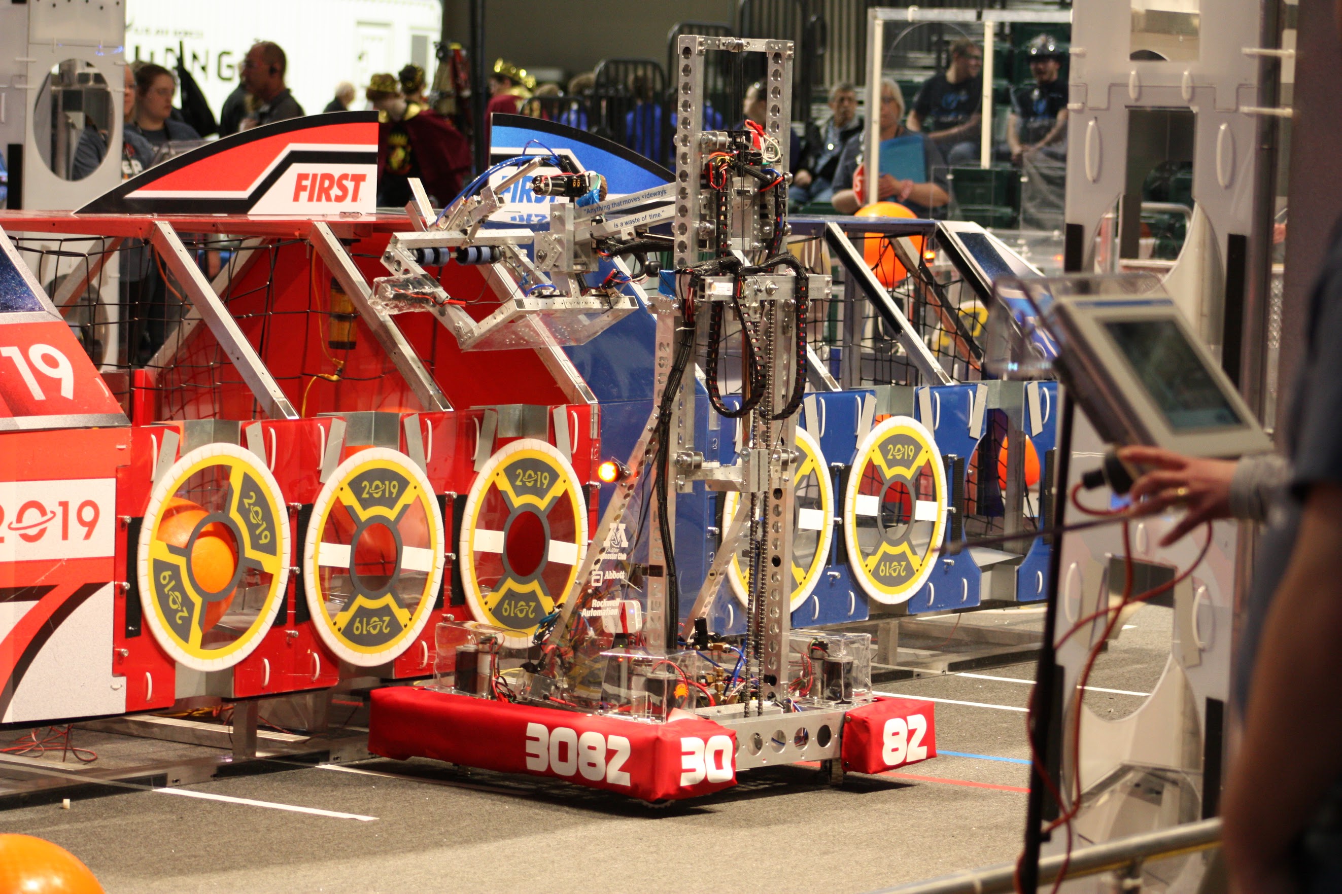 Team 3082's robot for 2019 scoring a game piece.